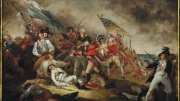 Historical battle scene with soldiers in red and blue uniforms, flags waving, chaotic action.