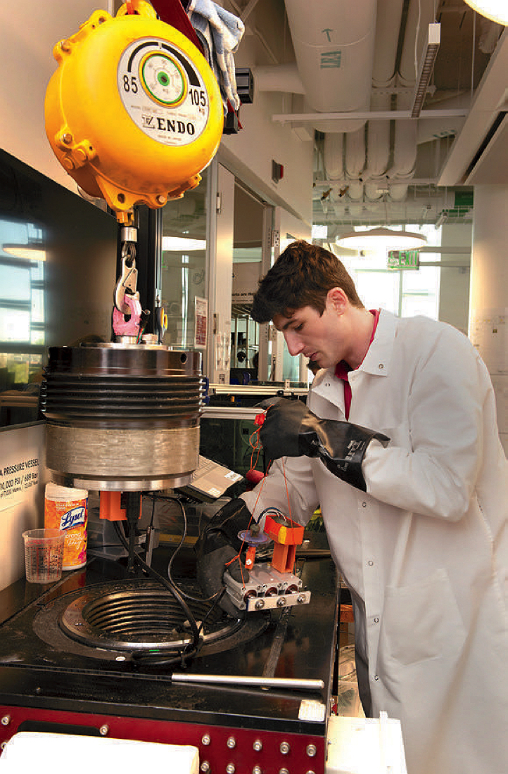 Germain Meyer using a pressure tank to simulate crushing forces at ocean depths
