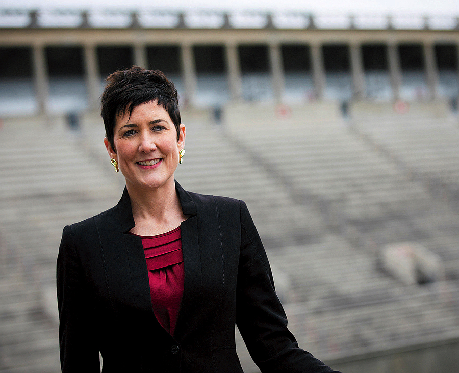 Erin McDermott with Harvard stadium in the background
