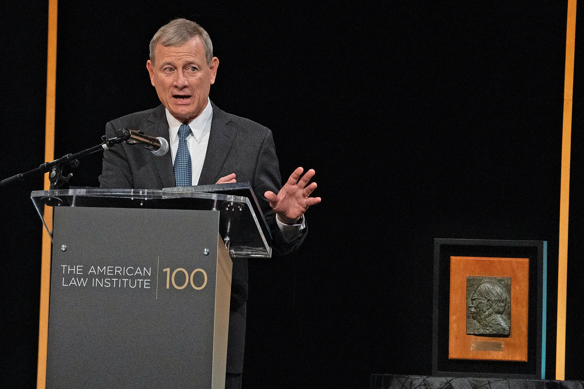 Justice Roberts at a podium giving a speech at the Henry J. Friendly Medal ceremony