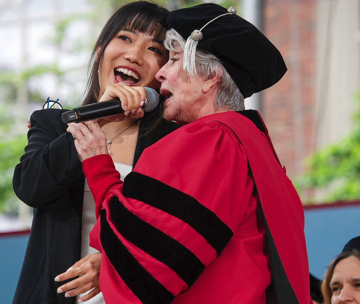 Rita Moreno and Carolyn Hao singing