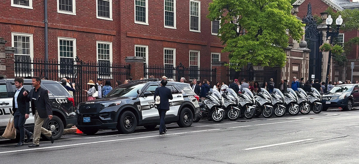 Police cars and Motorcycles lining Mass Ave