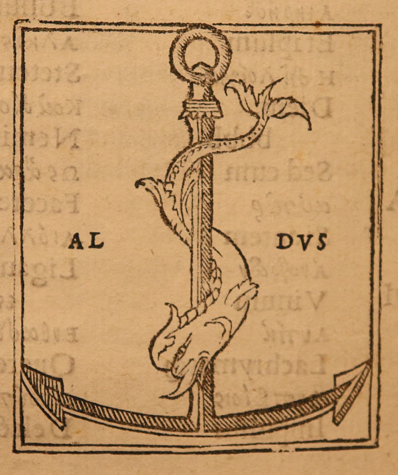 Stylized dolphin wrapped around an anchor with text “AL” and “DVS” on either side