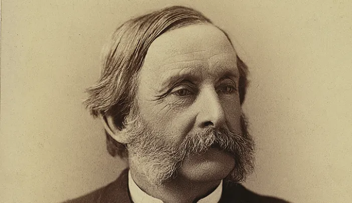 Portrait of Thomas Wentworth Higginson with a mustache and side-parted hair.