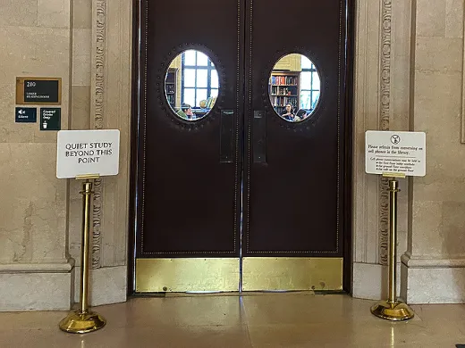 The entrance to Loker Reading Room, where a sign reads “quiet study beyond this point”